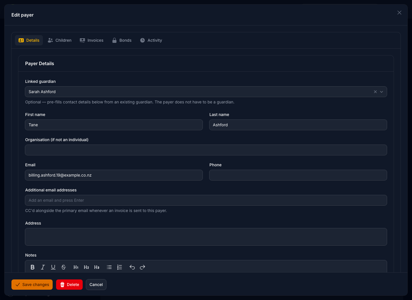 A payer record open for editing in dark mode, showing their name and contact details, the guardian they are linked to and the centre their child attends.