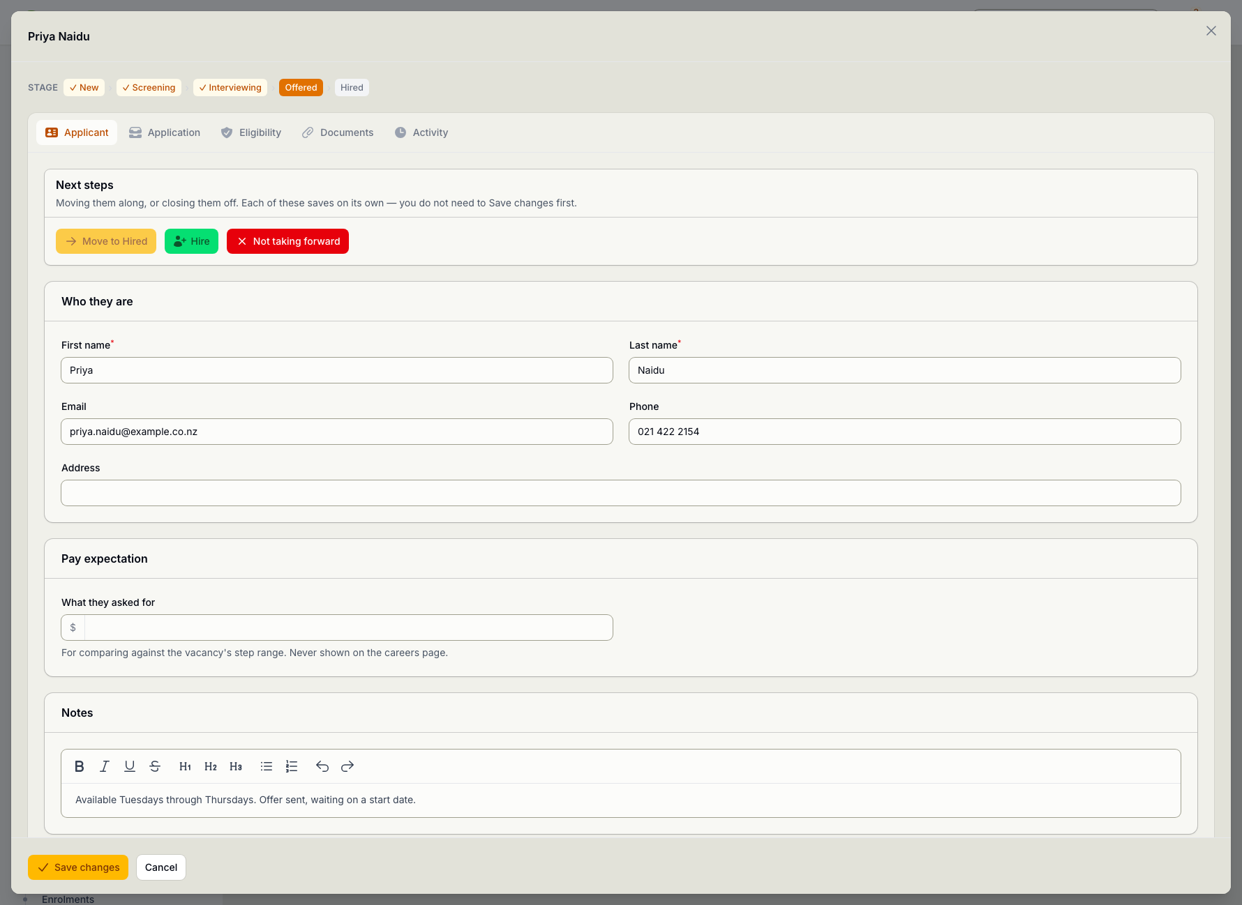 An applicant record open at the Offered stage, with tabs for the applicant, their application, eligibility, documents and activity, and buttons to move them to hired, hire them, or stop the process.