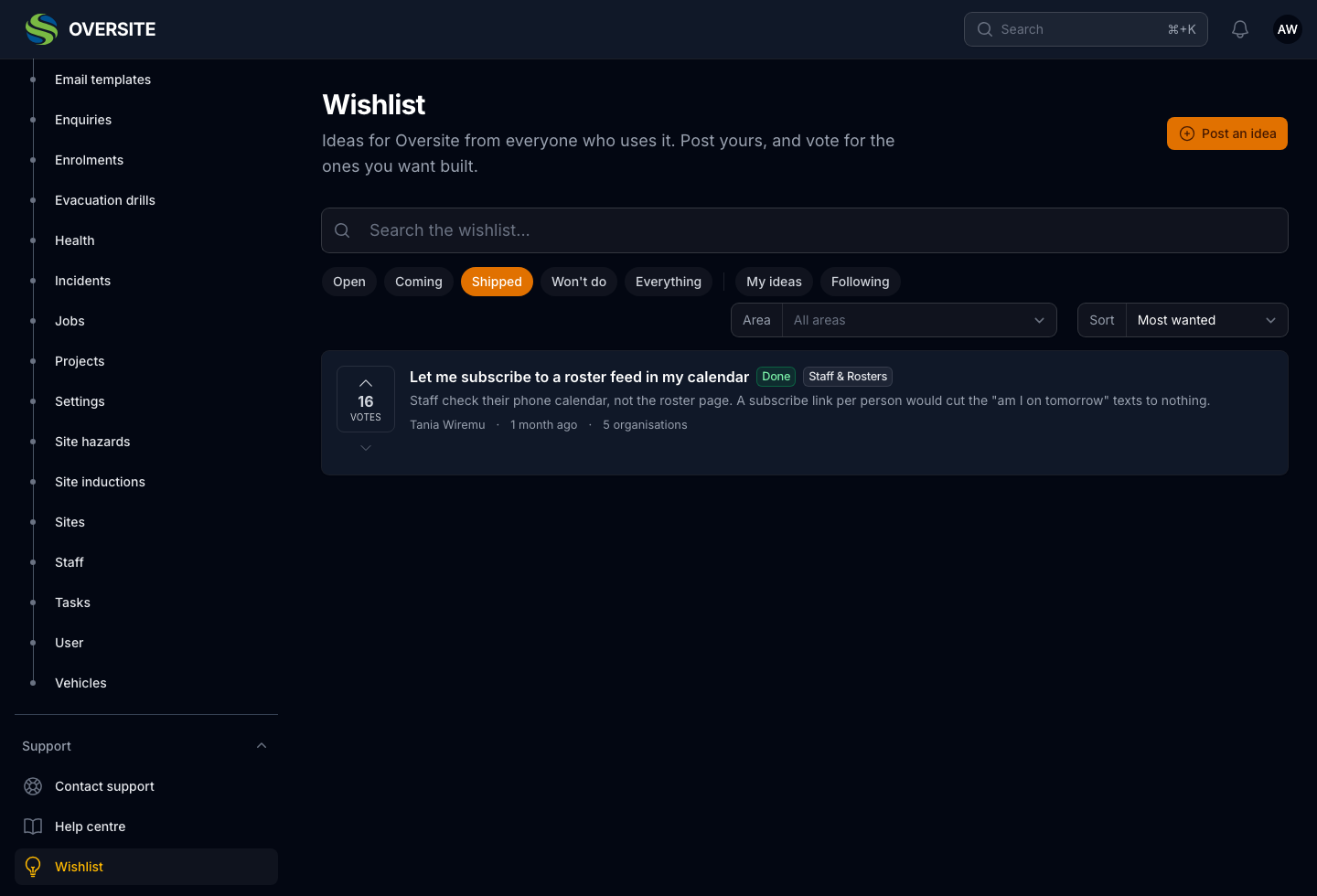 The Wishlist board in dark mode filtered to Shipped, showing ideas that have been built, each still carrying its votes, category and the number of organisations that asked for it.
